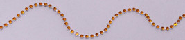 Imported Rhinestone Chain - Orange/Gold Rhinestones on Silver Trim BTY M211.36 - $10.99