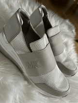 Michael kors silver sneaker size 9.5 slip on - $84.15