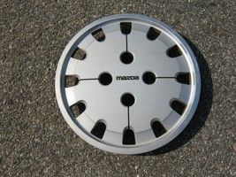 One genuine 1986 1987 Mazda 626 14 inch hubcap wheel cover - $18.50