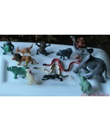 13 miniature Toy Plastic WILD Animals Elephant, Black Panther LION Rhino... - $247.08 MXN