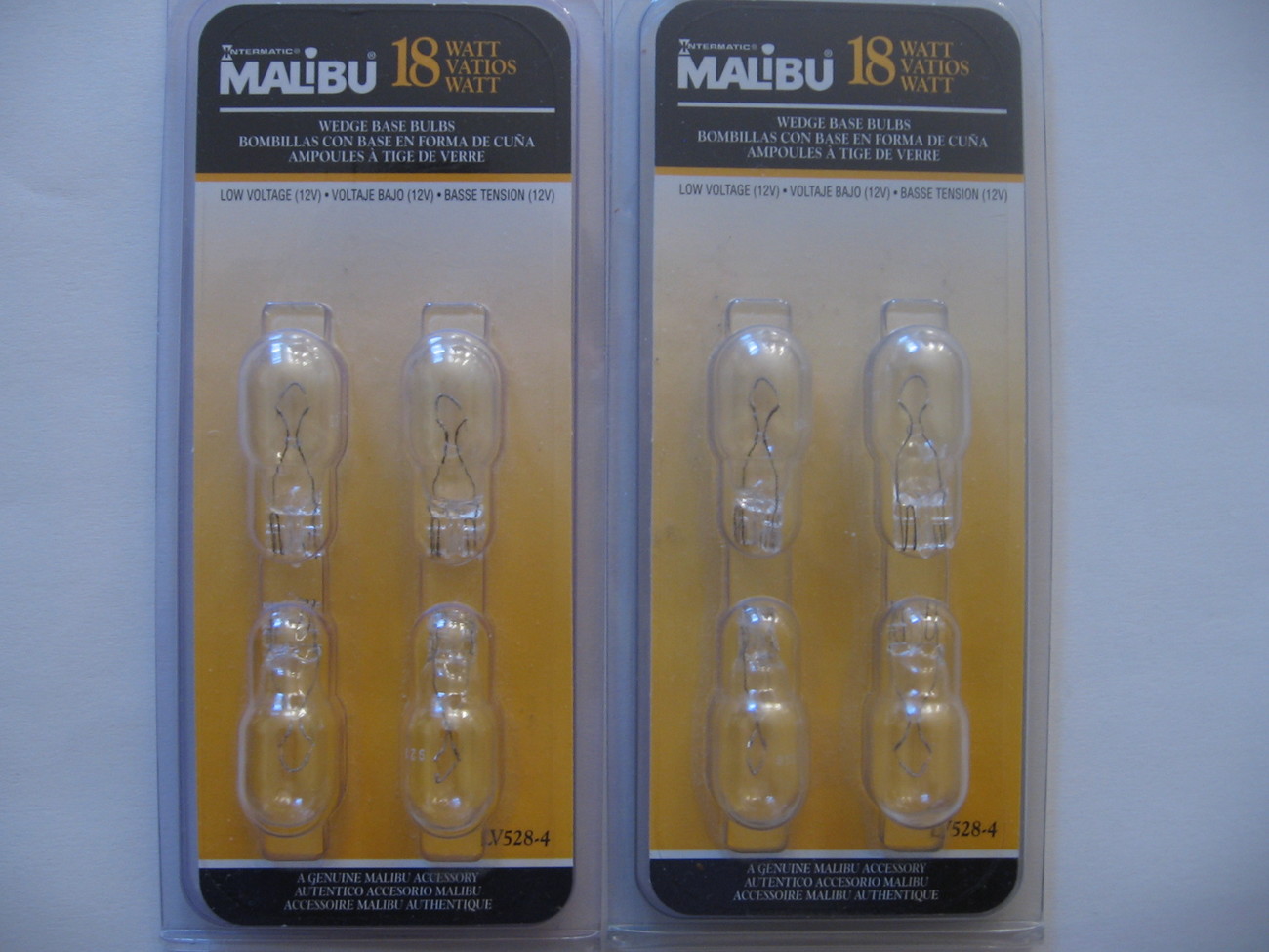 Two packs of Malibu 18 watt wedge base bulbs - $3.00