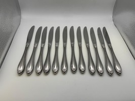 Set of 12 Oneida Stainless Steel SHERATON Dinner Knives - $65.40 CAD