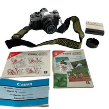 Canon AE-1 35 mm SLR Camera with FD 50 mm Lens Owners Manuals Japan Tested - £195.54 GBP