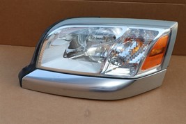 06-09 Mitsubishi Raider Headlight Head Light Lamp Driver Left LH image 1
