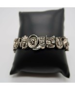 Fun vintage silver tone western themed slide charm bracelet - $27.22 CAD