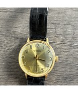 Futura Watch Antimagnetic Wind Up Mechanical Womens Gold Black Band - $376.62 MXN