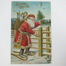 Vintage Christmas Postcard Old World Santa Fence Snow Shoes Toys Basket Antique - £14.21 GBP