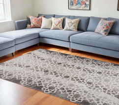 7&#39; X 10&#39; Brown and Beige Abstract Distressed Area Rug - $314.77