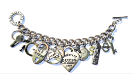 Guess Charm Bracelet  Silvertone Metal with some Copper Tone 7 1/2" - $14.95