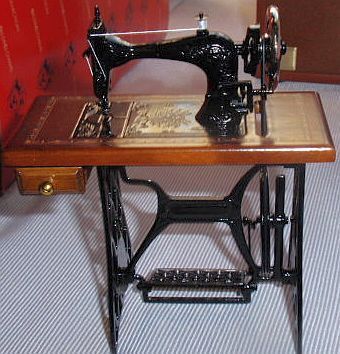 Wood and metal sewing machine miniature - $80.00
