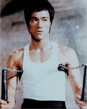 Bruce Lee holds nunchucks in famous scene 5x7 inch photo - £5.61 GBP