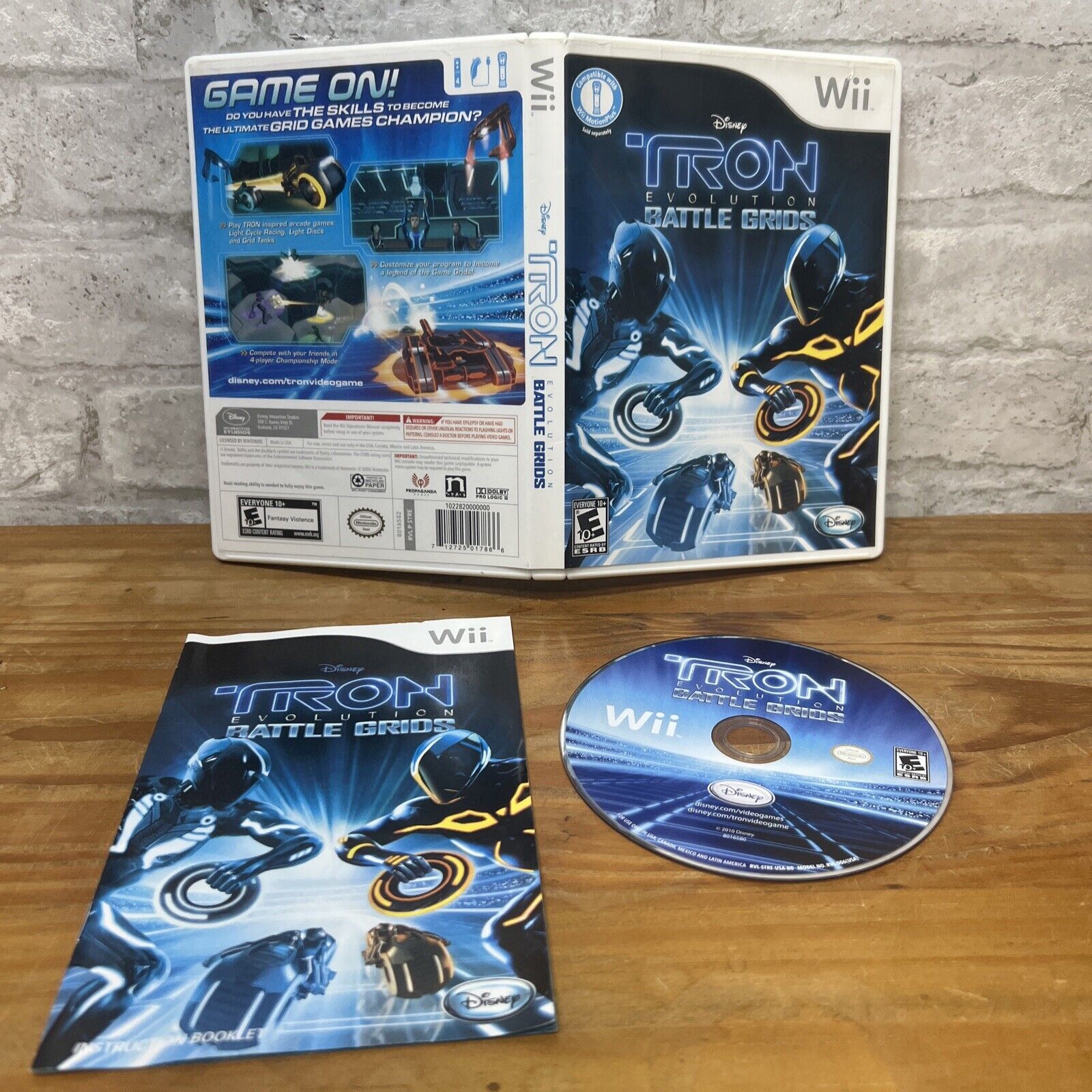 Primary image for Tron Evolution: Battle Grids (Nintendo Wii, 2006) Complete w Disc, Case & Manual