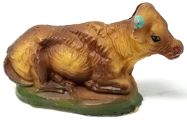 Cow Lying Down Celluloid Toy Figurine On Green Field Base Vintage - $11.35