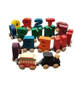 Magnetic Wooden Carved NAMETRAINS with 2 ASTORIA TROLLEY Carts 17pcs Inc... - $712.56 MXN