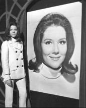 Diana Rigg poses next to giant poster of herself The Avengers TV 8x10 photo - £7.61 GBP