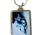 Basic Instinct Keychain Movie Memorbilia Sharon Stone Michael Douglas  - $5.02