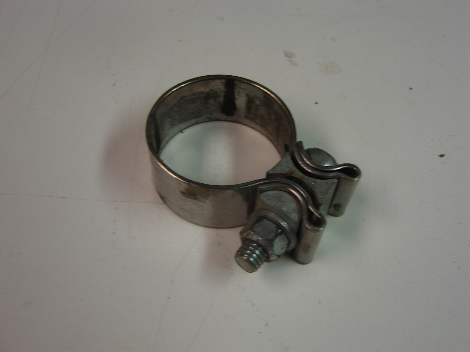 Harley muffler clamp from 1997 Heritage. 1-7/8&quot; x 1&quot; wide - $7.67