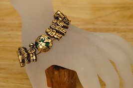 Vintage Costume Jewelry Children Around The World Globe Slide Charm Brac... - $364.28 MXN