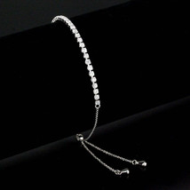 3W1643 - Rhodium Brass Bracelet with AAA Grade CZ in Clear - $508.83 MXN