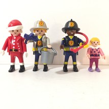 Lot of 4 Vintage Geobra Playmobil 2 Different Firefighters Santa and an Elf - £9.50 GBP