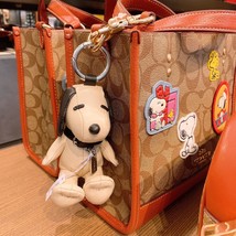 NWT Coach X Peanuts Snoopy Collectible Bag Charm/ Keychain In Signature Canvas - $137.61+