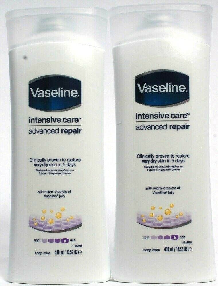 Primary image for 2 Bottles Vaseline 13.52 Oz Intensive Care Advanced Repair Rich Body Lotion