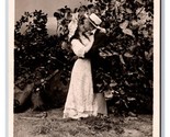 RPPC Bamforth Romance Face in Moon Shade of Old Apple Tree DB Postcard V1 - $4.90