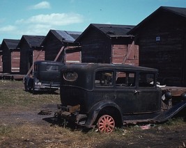 Condemned shacks and rusted cars used by migrant workers Florida Photo Print - $8.81+
