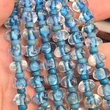 Collana vintage fatta a mano con perle in vetro blu soffiato a forma di... - $698.42 MXN