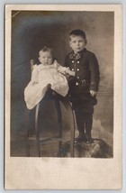 RPPC Sweet Children Brother with Baby Unique Antique Chair c1910 Postcard I28 - £7.04 GBP