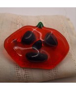 Glass orange and black jack-o-lantern brooch - $9.00