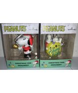 NEW Lot of 2 Hallmark Snoopy Ornaments Peanuts 2022 Snoopy Santa Shiny &amp;... - $418.00 MXN