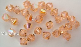 8 4 mm Swarovski 5301 Crystal Bicones -- Light Peach AB - £0.95 GBP