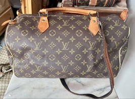 Authenticity Guarantee 
Louis Vuitton Speedy Duffle Brown Leather - £639.48 GBP