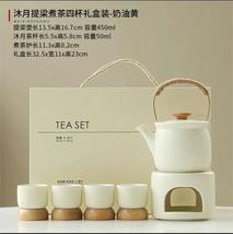Cream yellow and secret language pink tea-making tea set. - $288.00