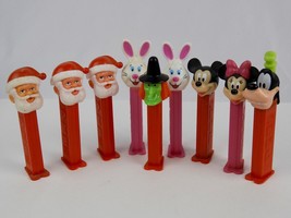 Lot  9 Vintage Pez Dispencers Witch Santa Claus Easter Bunny Mickey Minnie Goofy - £15.81 GBP