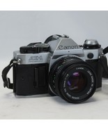 Canon AE-1 35mm SLR Film Camera with Canon 50mm f/1.8 FD Lens Tested Wor... - €184,56 EUR