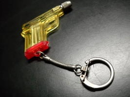 Key Chain Screwdriver Gun with Three Attachments Red Yellow Made in Hong Kong - $9.99