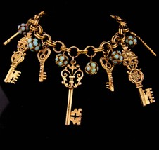 Vintage large skeleton Charm bracelet - turquoise rhinestones key charms... - £114.06 GBP
