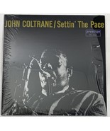 John Coltrane / Settin&#39; The Pace Vinyl Record - $136.28 CAD