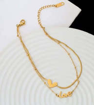 Double anklet with heart and love - $184.16 MXN