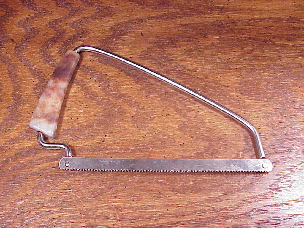 Old Frozen Food Saw - $8.45