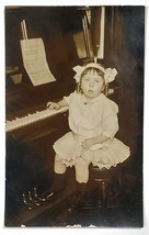 RPPC Little Girl at Piano Sheet Music Hair Bow Real Photo Postcard F21 - £12.78 GBP