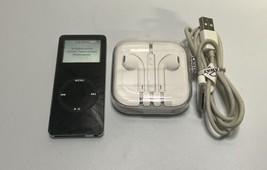 Apple iPod Nano Model A1137,  1st Generation 2GB - Black Bundle READ - $22.46