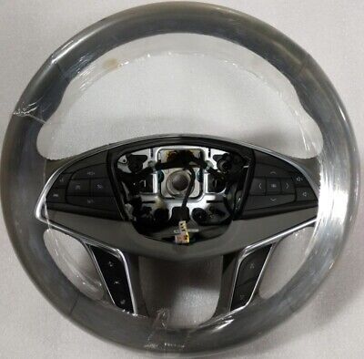 Primary image for Dark Titanium factory original steering wheel for 2017 Cadillac XT5. Never used