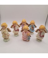 8 Angel Tiny Figures - $269.03 MXN
