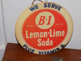 Vintage We Serve B-1 Lemon Lime Soda Celluloid Tin Over cardboard Sign - $198.00