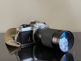 Nikon Japan FE Chrome Camera w Tokina AT-X 35-200mm Lens, Rokunar Filter & Strap - $138.60