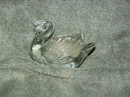 clear molded glass SWAN filled with white CANDLE 3 x 4.5 x 2.5 inches (D)  - $5.94