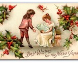 Best Wishes For New Year Holly Courtship Scene Embossed DB Postcard A16 - $4.90